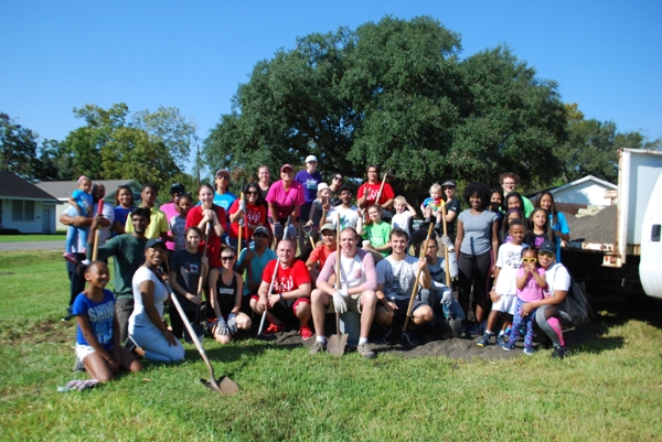 community members join LU student volunteers at Community Garden