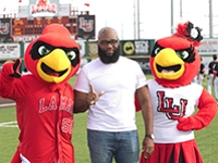 Chris Bates with Big Red and LU