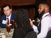 Student learn from successful alumni in their fields at A Dinner and Conversation