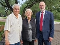 Bill and Mary Mitchell with Ken Evans at the Austin Area LU Party at the home of Mr. and Mrs. Bill Mitchell
