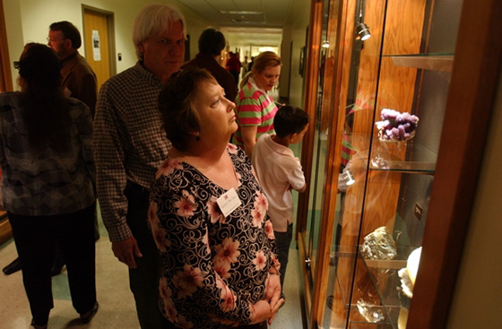 Visitor during opening of mineral exhibit