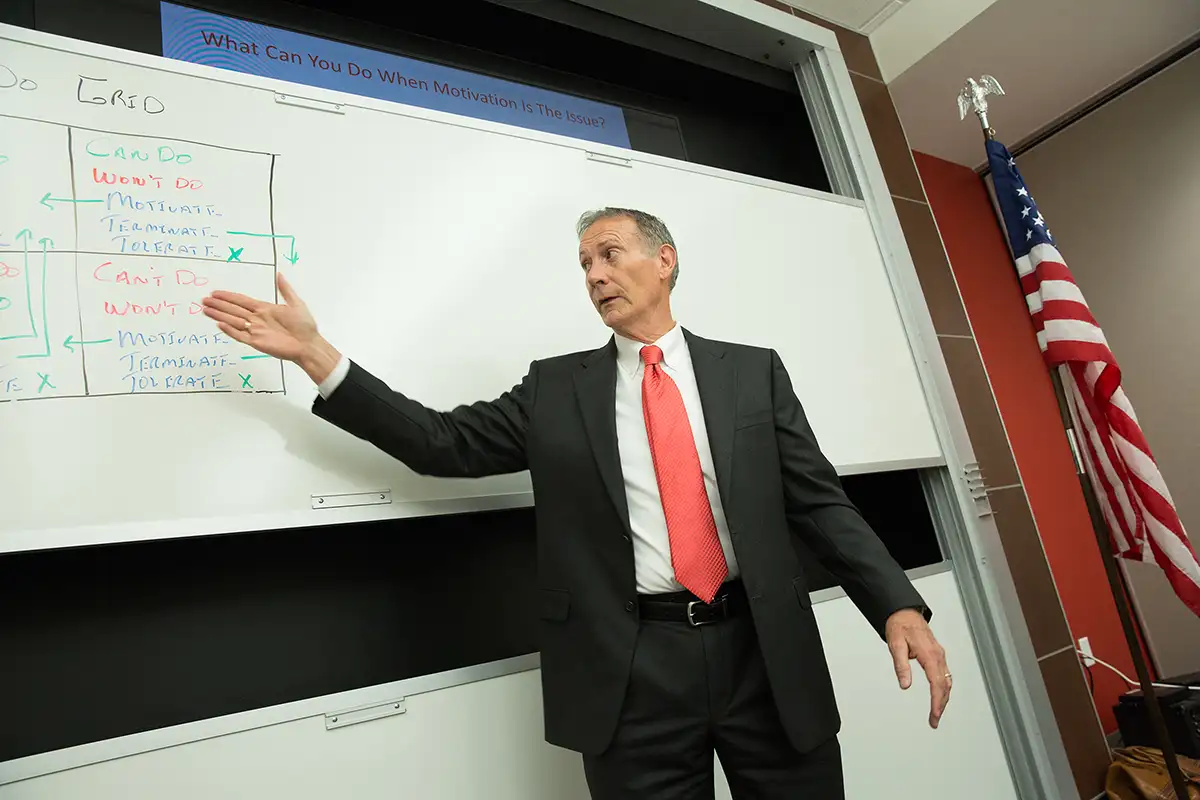 Professor teaches in a classroom