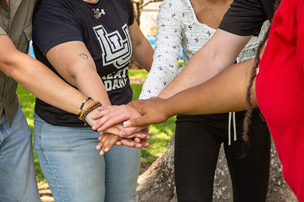 LU students hands in support