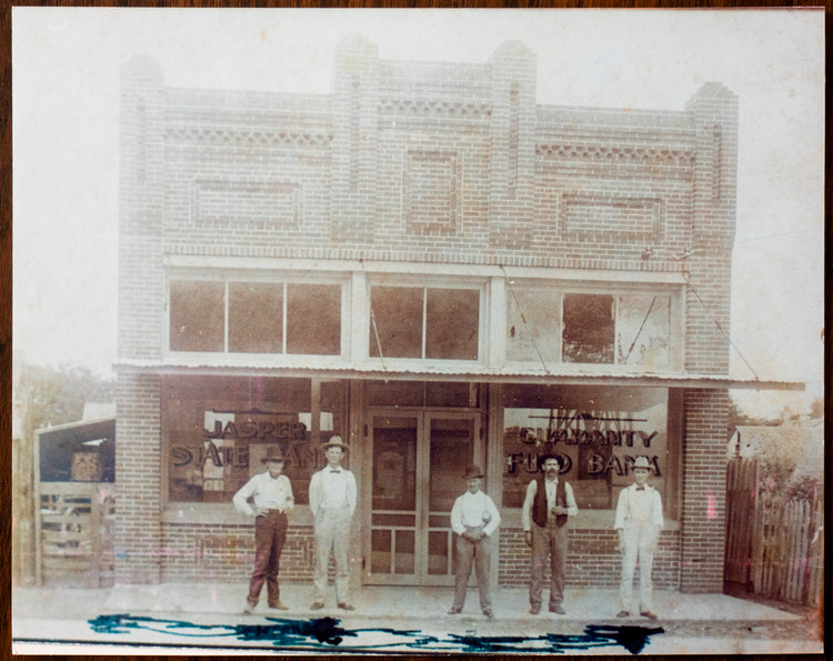 dc men standing infront of a building