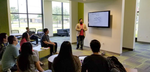 This is a picture of our Commercialization Associate, Tejus Mane, speaking to students and faculty in the Hatchery about the Cardinal Rise program and the first steps to commercializing their technologies.