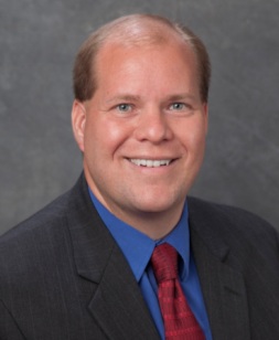 Dr. Tracy John Benson