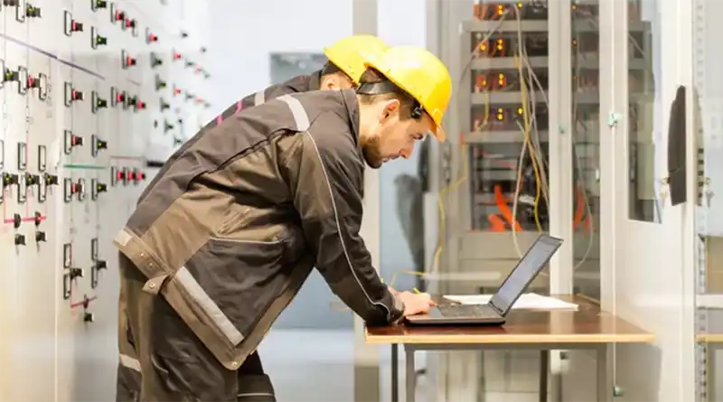 Engineers inspect relay