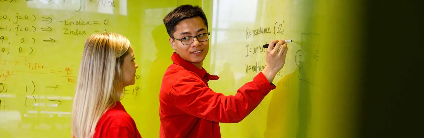 Acad Calendary - Students discussing formula in Hatchery
