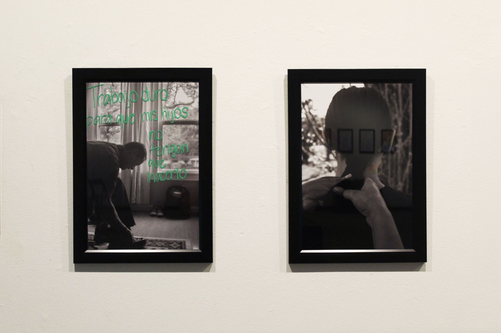 Two black and white framed photographs on a white wall; left photo has green text overlay.