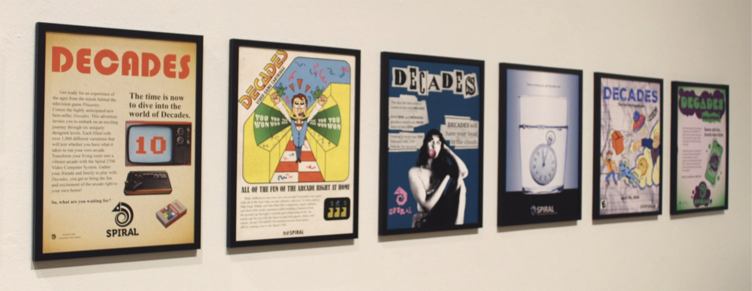 Six framed posters with various designs under the theme "Decades."