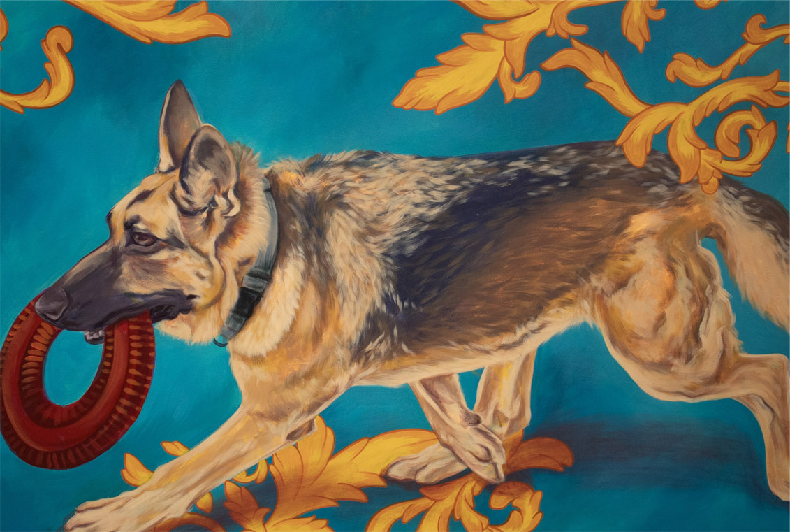 A German Shepherd with a red ring in its mouth against a teal background with golden decorative swirls.