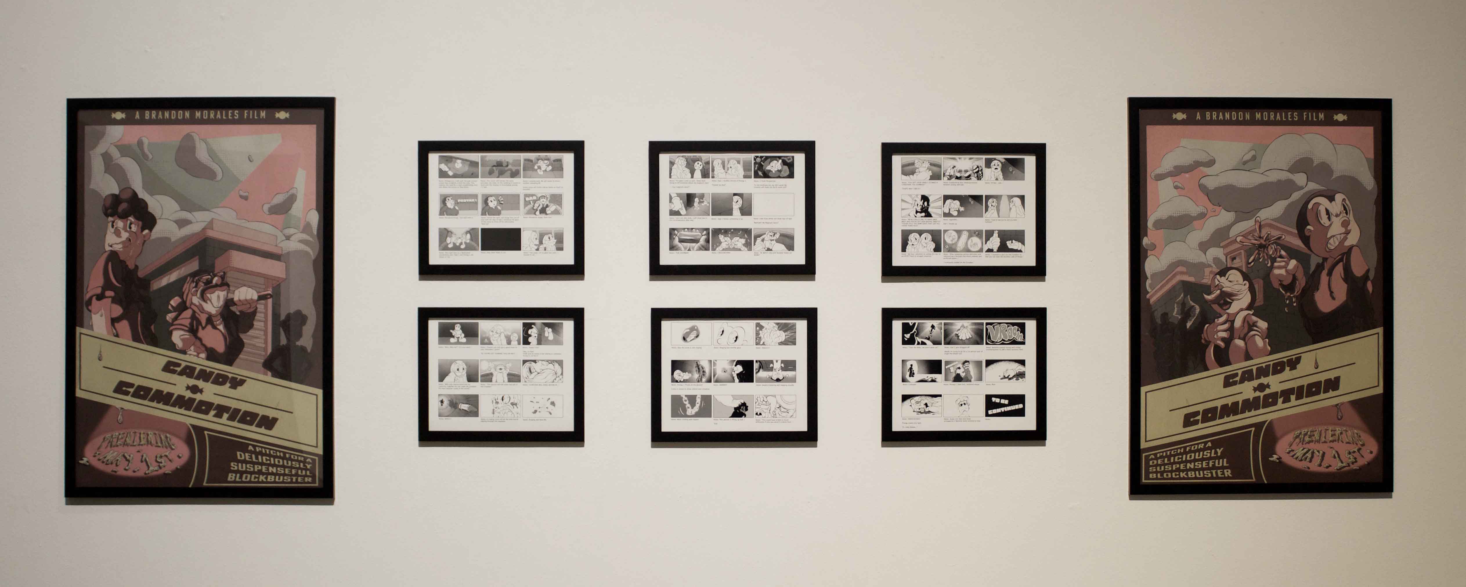Framed collection of posters and storyboard illustrations on a white wall.