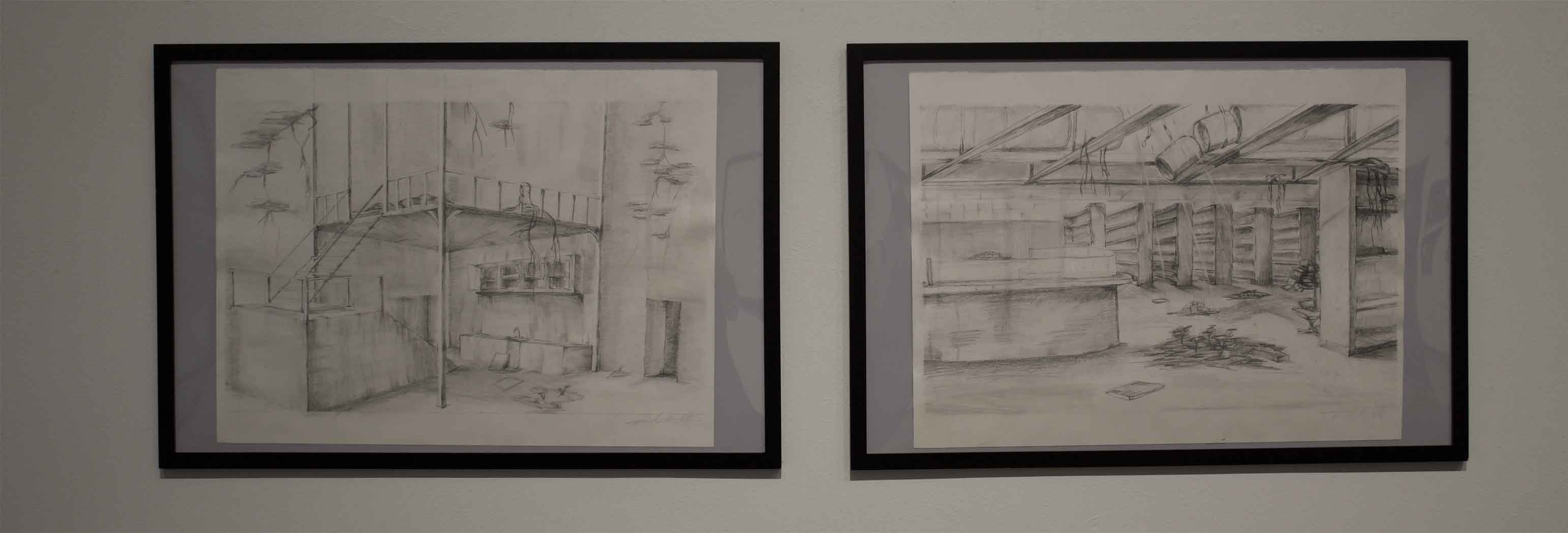 Two framed pencil sketches of industrial interiors, one with stairs, and one with shelves.