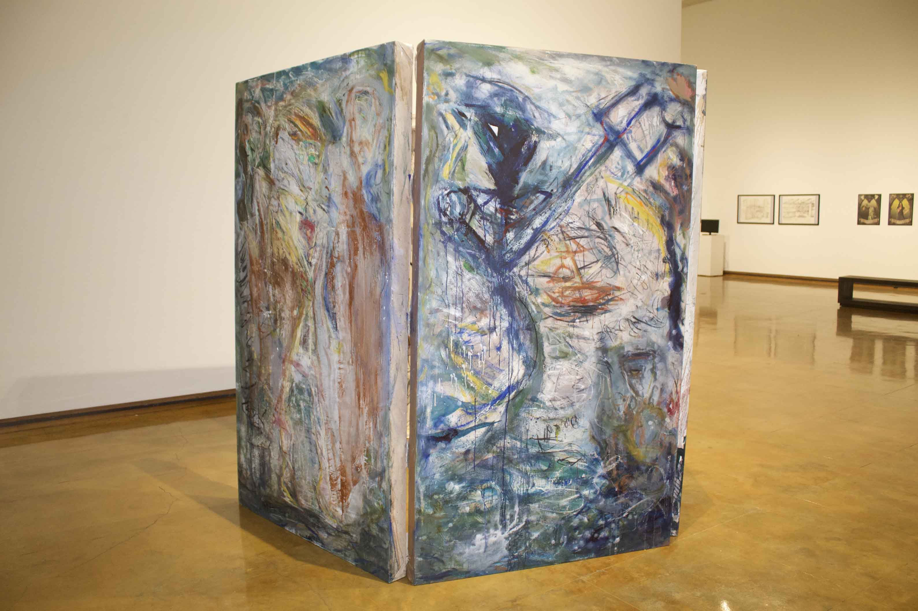 Abstract folding panel with colorful brushstrokes in an art gallery.
