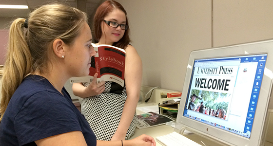 Students working on the University Press newspaper