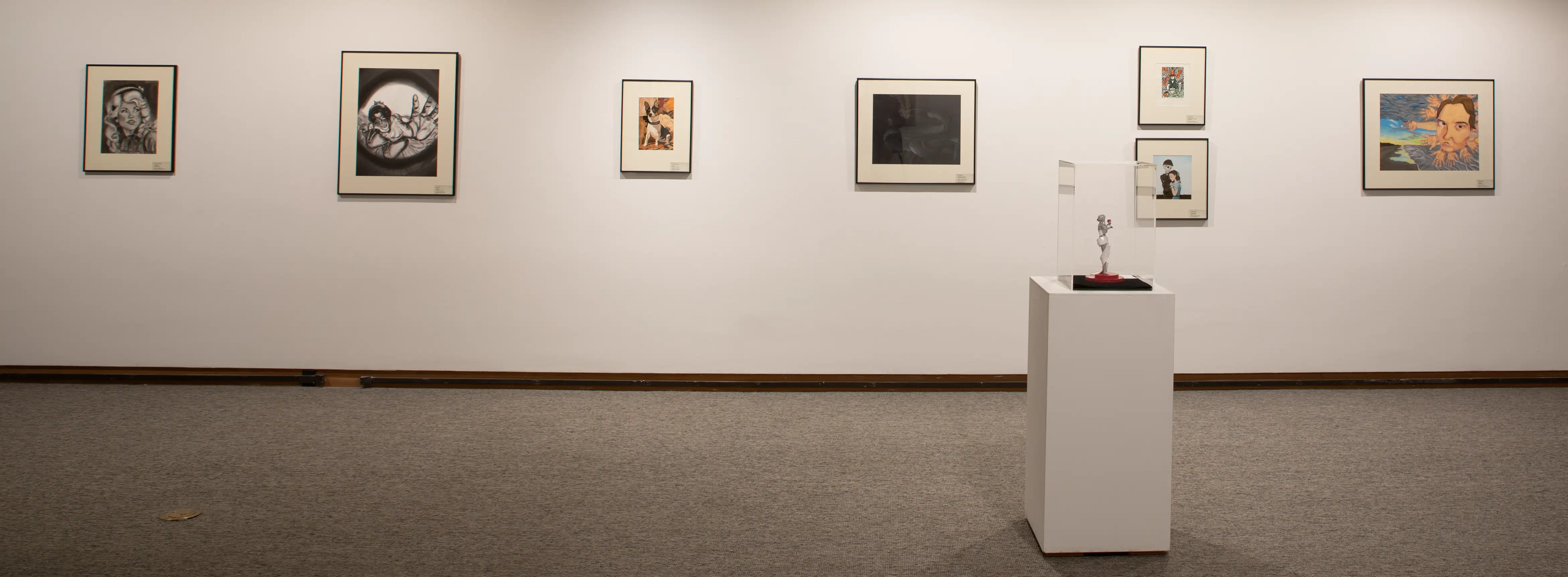 Protege 2024 - various art projects hanging on wall