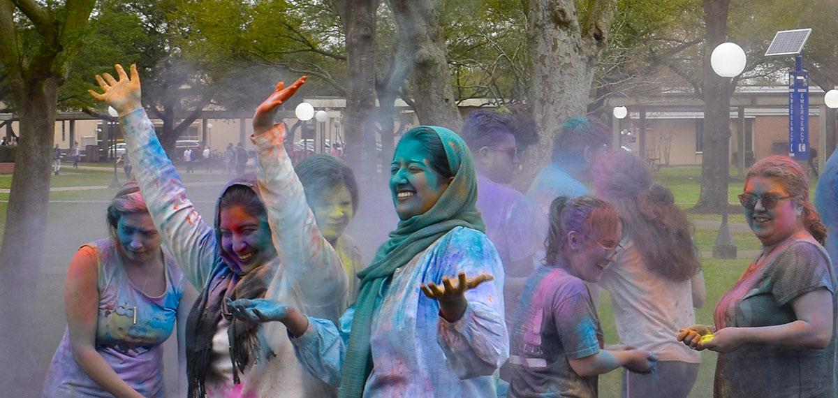 holi-celebration-students-covered-in-colorful-powder.jpg