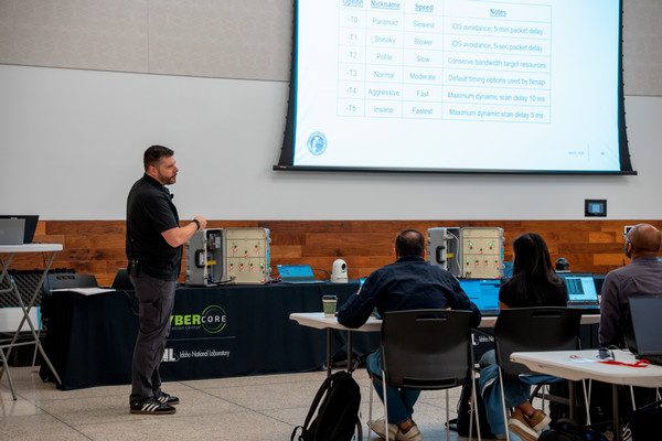 Man presenting a Cybersecurity Training class