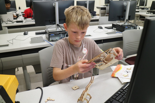 Cybersecurity, robotics camp introduces students to STEM