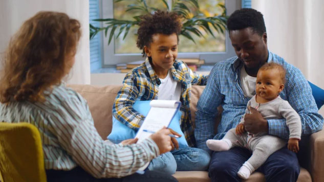 social worker with family