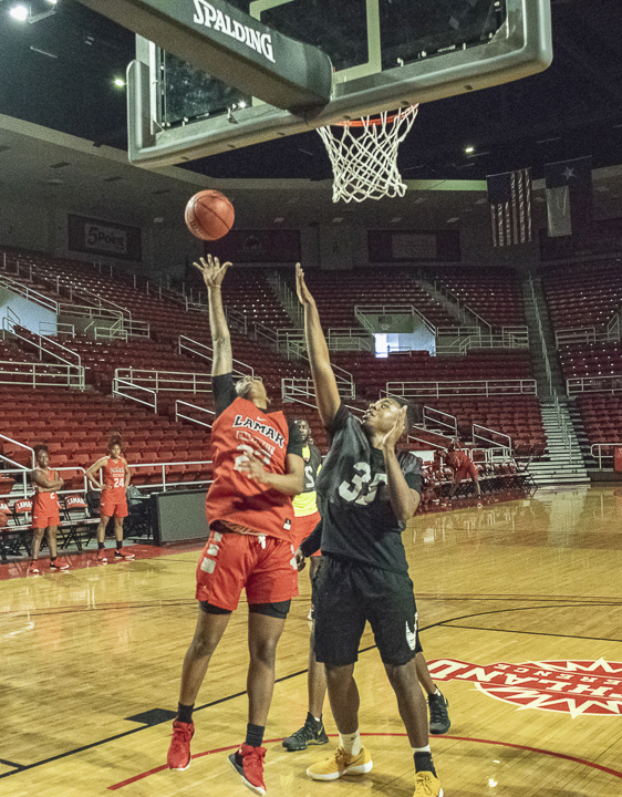 Miya Crump, freshman forward, goes for a layup during practice in the Montagne Center, March 19. UP photos by Lakota Jaton