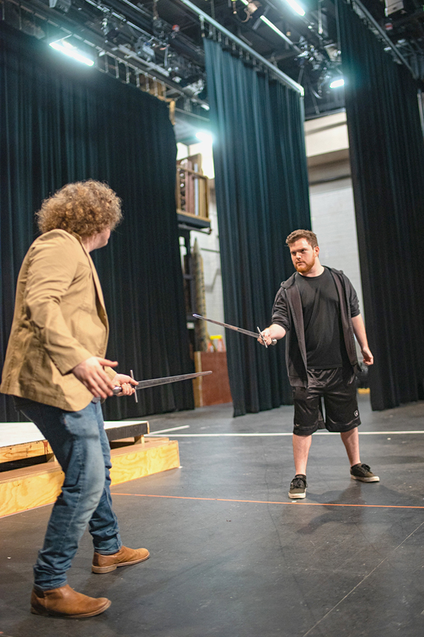 Nathan Crump, a Vidor resident playing Antipholis of Syracuse, right, and Josh Pendino, a Lamar sophomore who is playing Balthasar, left, practices for their upcoming play, “The Comedy of Errors” in the University Theatre, Friday. UP photo by Noah Dawlearn