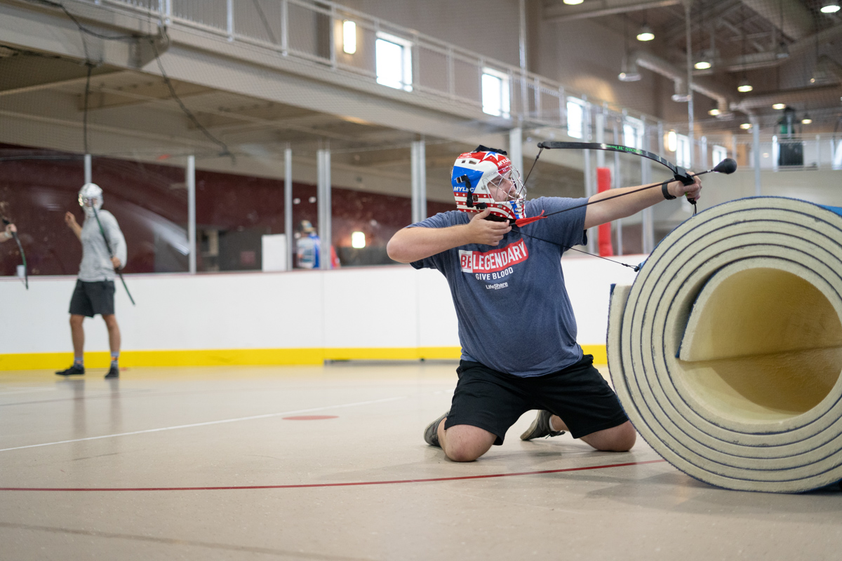Stephen Rambin, Chemical Engineering Major from Mauiceville, aims his air in archery tag at the indoor soccer arena in the Sheila Umphrey Recreational Sports Center on Aug 28.