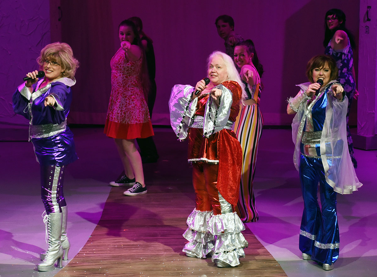 Suzanne Kibodeaux, left, Roxane Gray and Janci Kimball perform "Dancing Queen" during BCP's "Mamma Mia." Courtesy photo