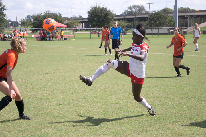 LU’s Esther Okoronkwo crosses the ball during Saturday’s 5-0 win over Sam Houston State at the LU Soccer Complex. Okoronkwo scored twice, giving her 11 on the season.