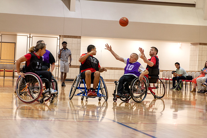 Faculty and students play a game of wheelchair basketball at the Sheila Umphrey Recreational Center, Oct. 8. UP photo by Delicia Rocha