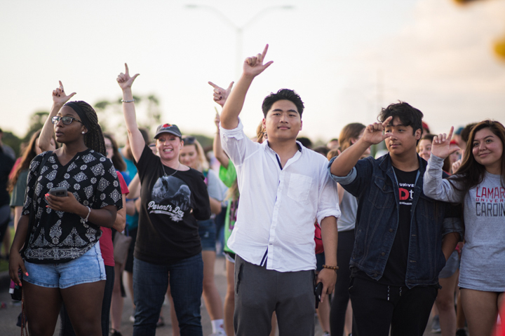 Students cheers at Lamar University's Homecoming Pep Rally and Bonfire, Sept. 27. UP photo by Noah Dawlearn