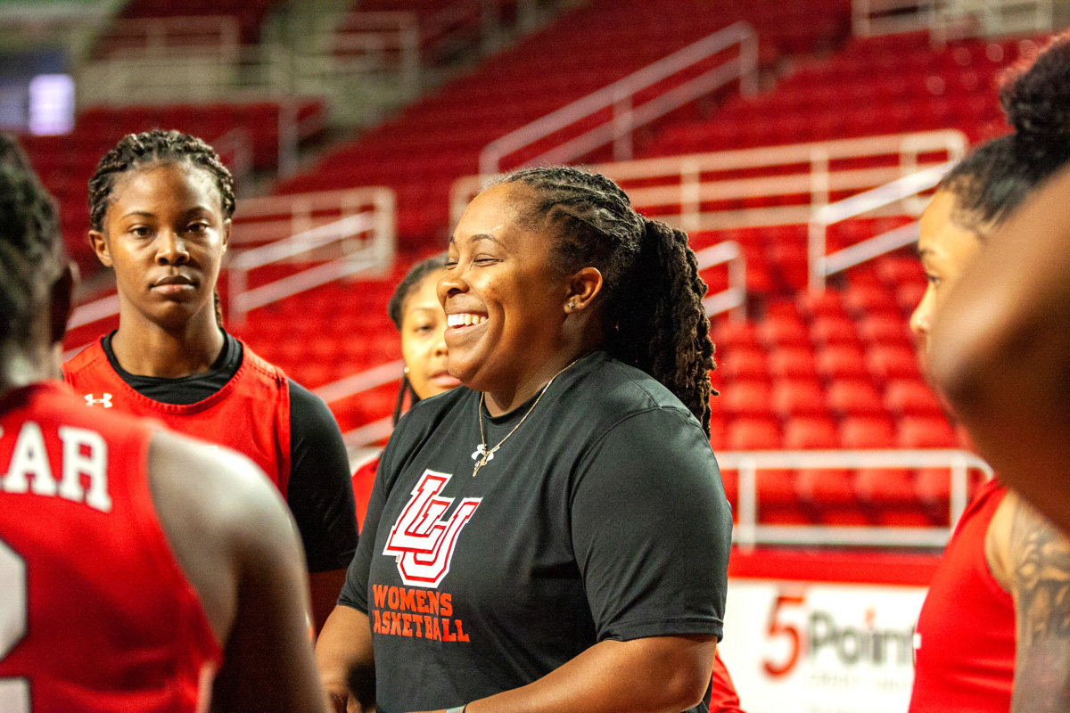 Aqua Franklin, above, interacts with the Lady Cards basketball team at practice, Nov. 19. This is her first year at the helm of the Lady Cards Basketball team. UP photo by Delicia Rocha