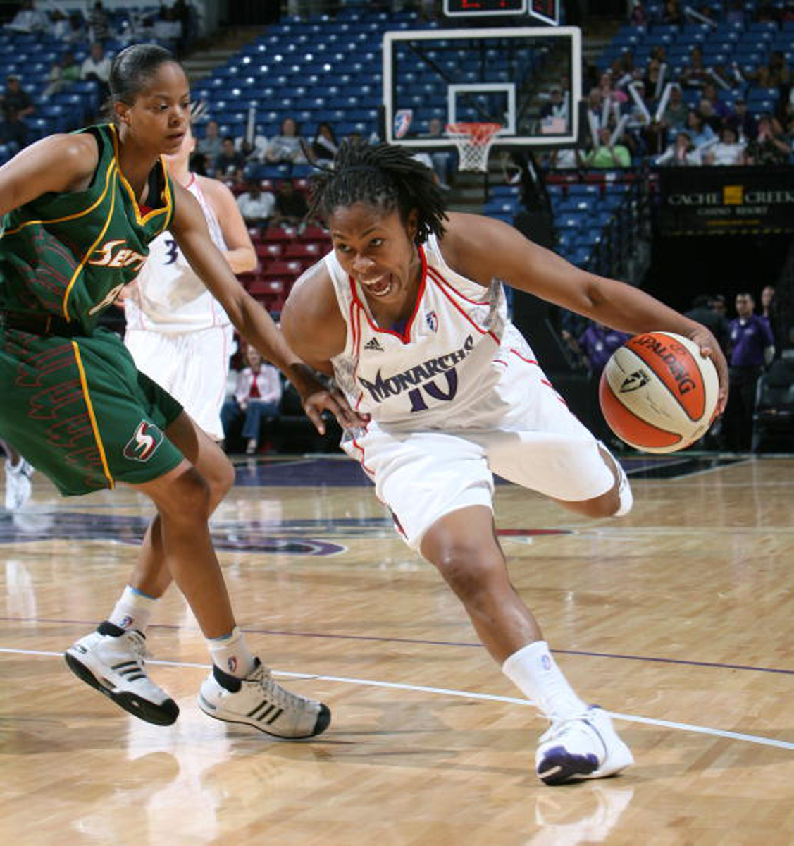 Franklin (left) in action for the Sacramento Monarchs in a game against the Seattle Storm during her WNBA playing days.