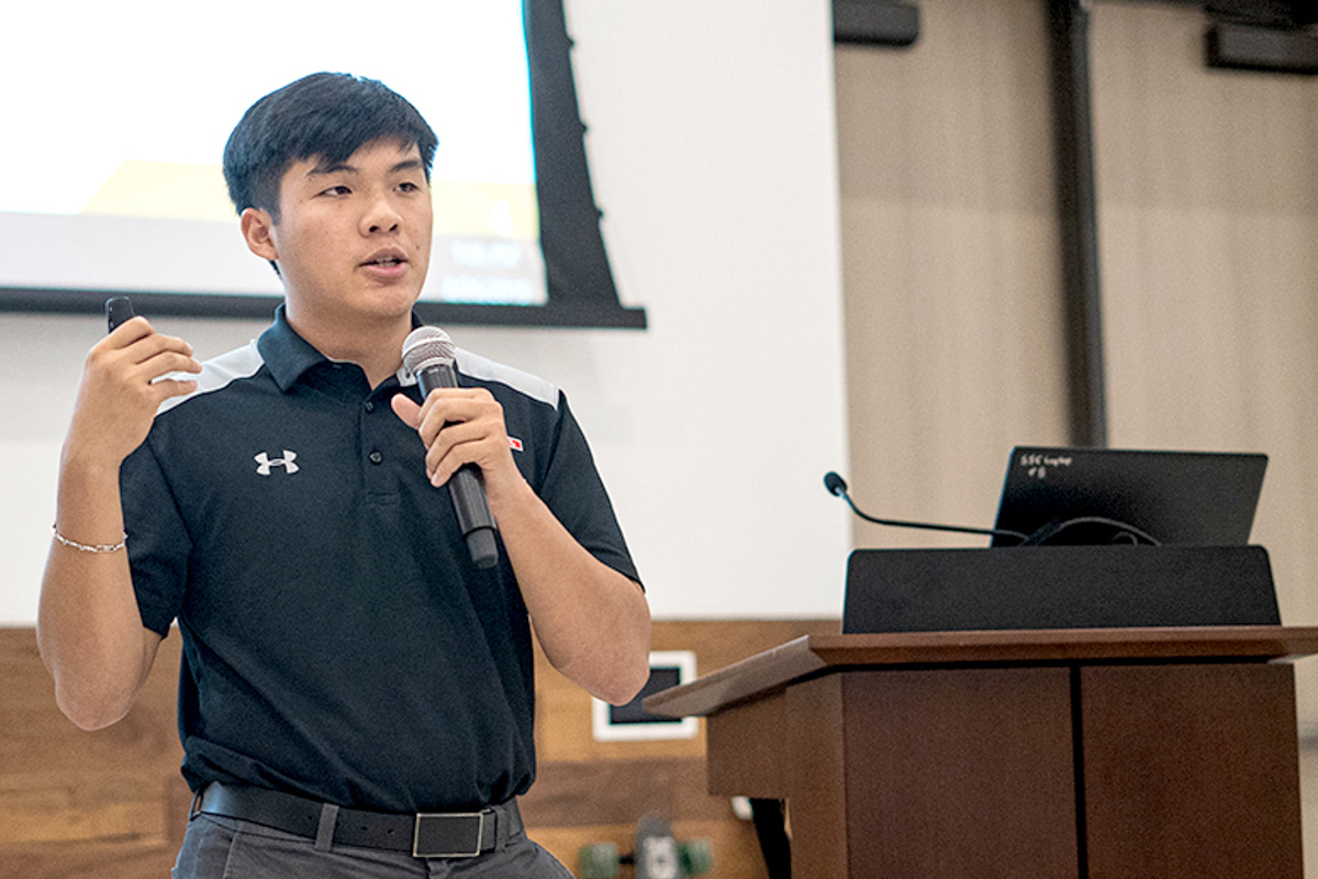 Student Government Association president Edward Doan, above, explains SGA’s proposed initiatives for more campus inclusivity during an open table discussion  in the Live Oak Ballroom in September. UP photo by Noah Dawlearn