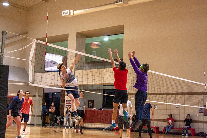 Students play a round of volleyball at Late Night at the Rec on Jan. 24 at the Sheila Umphrey Recreational Center. UP Photo by Delicia Rocha.
