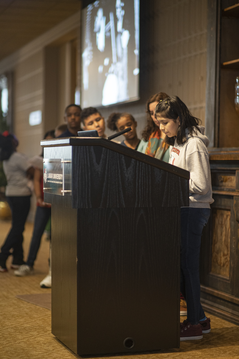 Students from a local school read Martin Luther Kings’s I have a dream speech during the MLK day Event that was hosted in the 8th floor of the John and Mary Gray Library on Thursday. UP Photo by Noah Dawlearn
