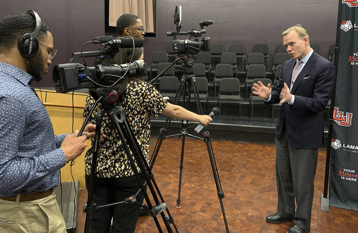 John Dickerson gives an interview to Channel 6 and LUTV News, Monday, in the Rothwell Recital Hall. UP photo by Olivia Malick