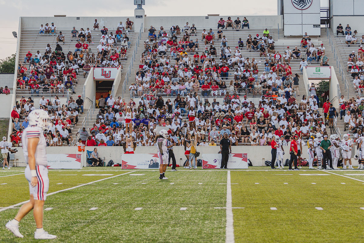 The crowd is seen wearing white for the "White Out" football game against University of Idaho, at Provost Umphrey Stadium, Aug. 31. UP photo by Brian Quijada.