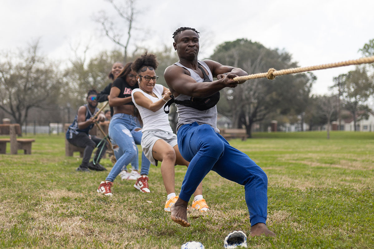 Students play tug-of-war against each other at the Black History Month Block Party, Feb. 24, at Cardinal Park. UP photo by Brian Quijada.