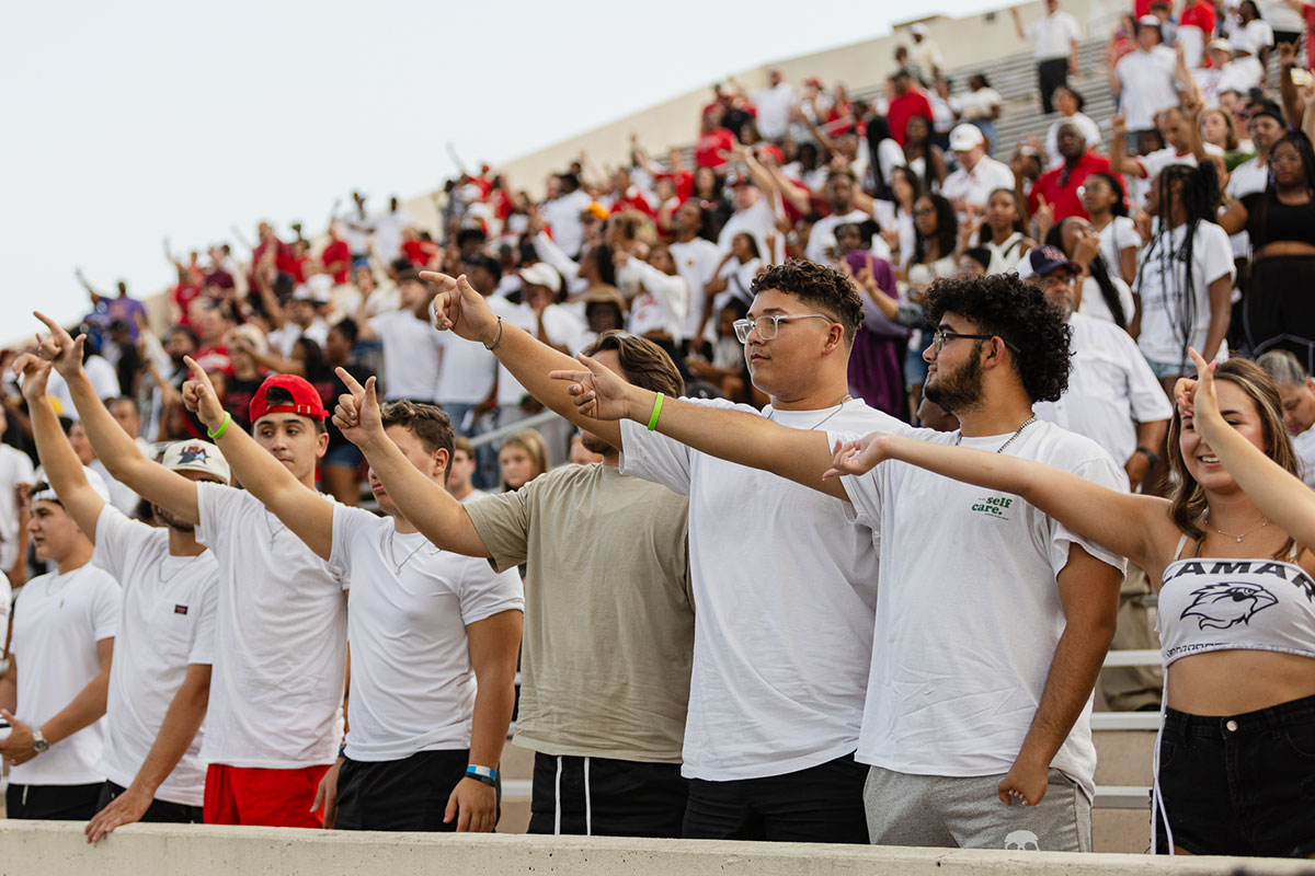 Lamar crowd holds up the "L" for the school song before the game against University of Idaho, at Provost Umphrey Stadium, Aug. 31. UP photo by Brian Quijada.