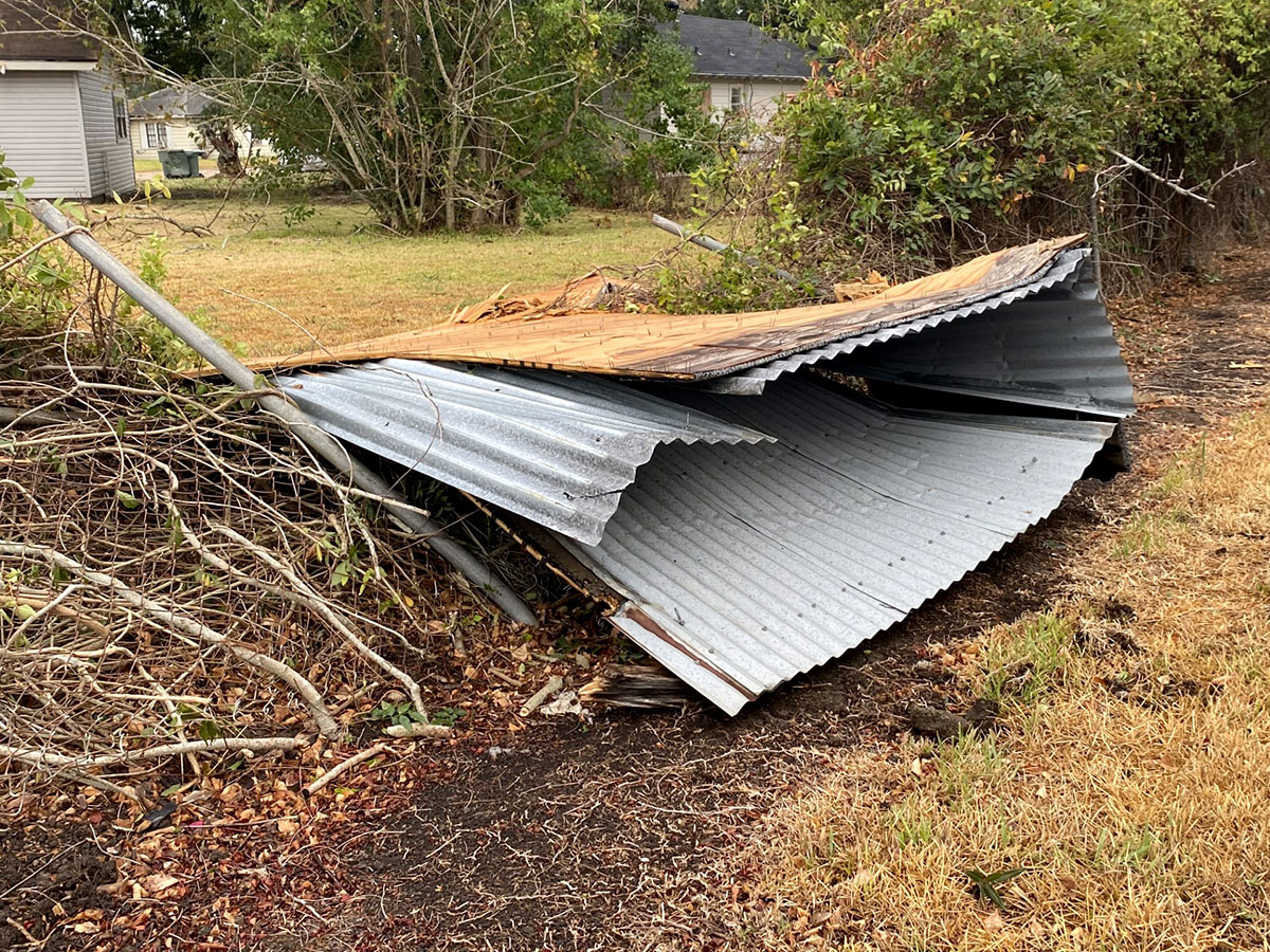 A piece of the structure which fell onto a nearby fence. UP photo by Maddie Sims.