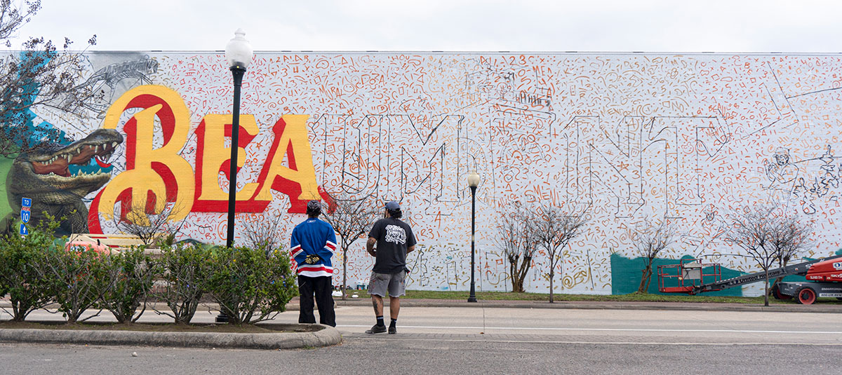  Floyd Mendoza III looks back at his mural during Mural Fest 2024, in downtown Beaumont, Mar. 2. UP photo by Carlos Viloria.