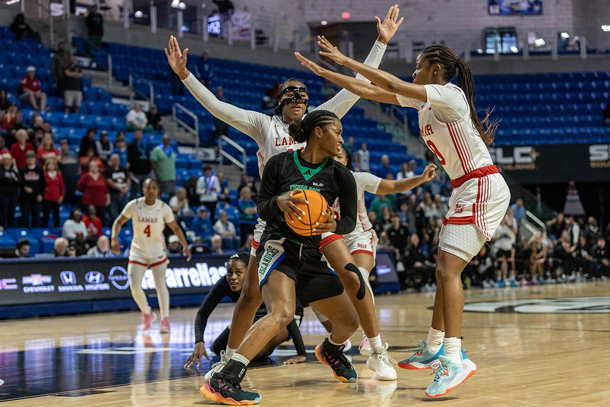  LU”s Akasha Davis and Malay McQueen guard a TAMUCC player during the Southland Conference tournament final, in The Legacy Center, Lake Charles, La. March 14. UP photo by Brian Quijada.